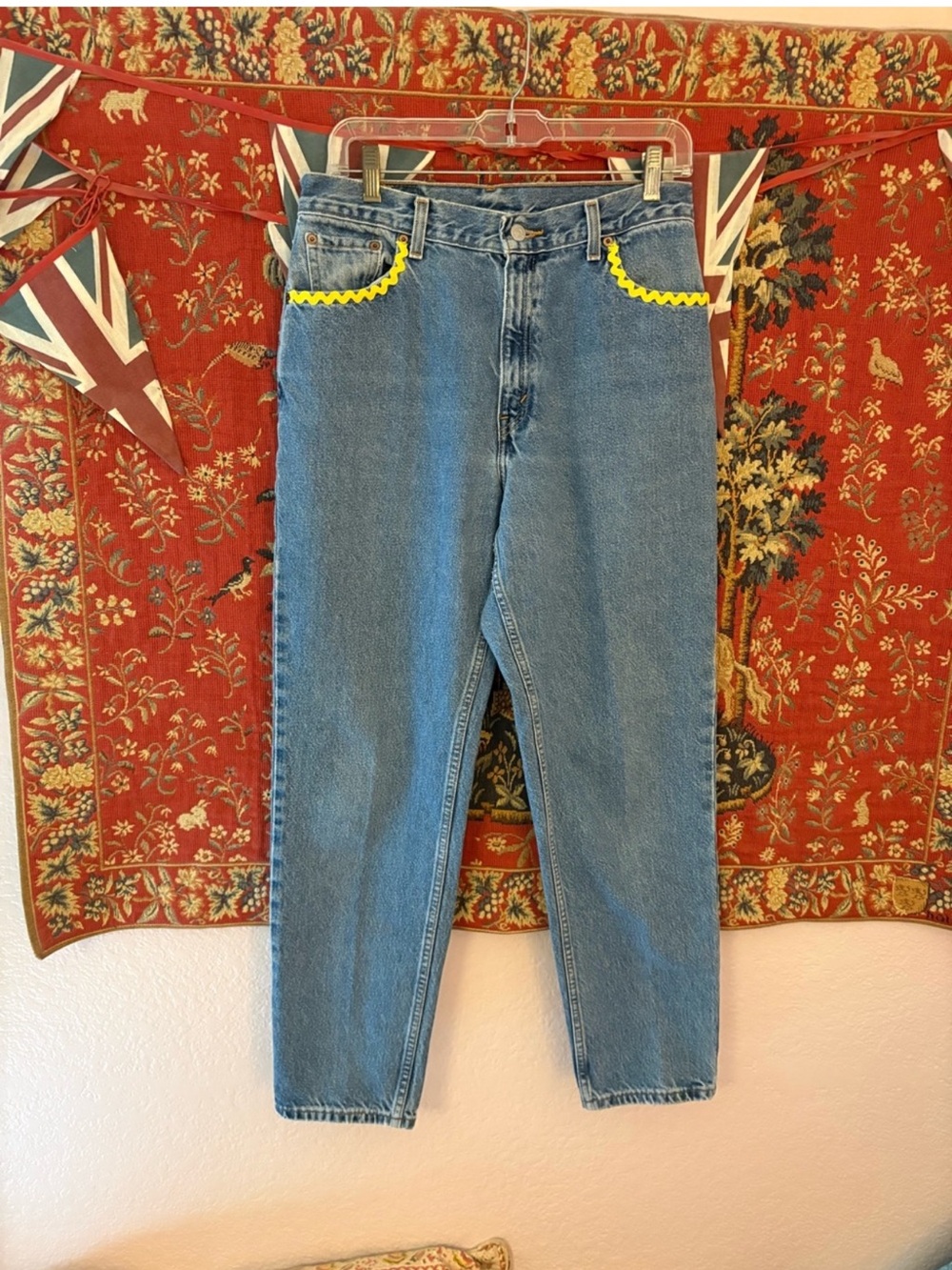 Levi’s 550 High-Waist Tappered Blue Denim Jeans with Yellow Trim Floral Appliqué